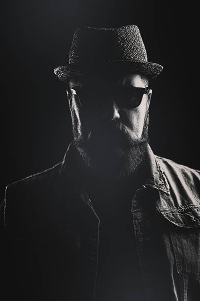 The men in the porkpie hats